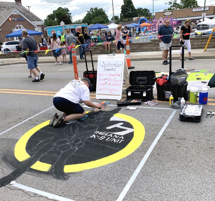 Chalk artists leave their mark on Main, at least until it rains News